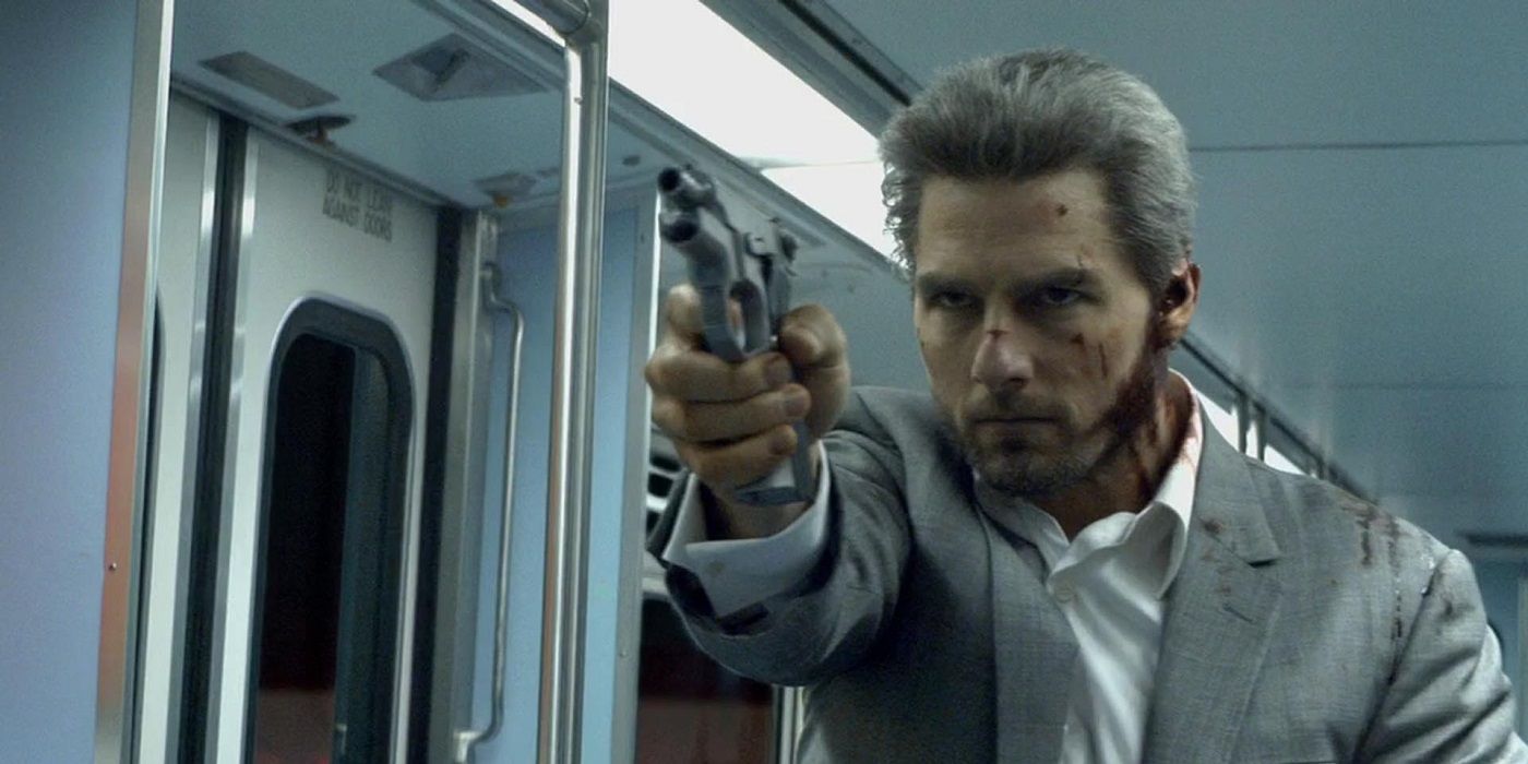 Tom Cruise on a train with a gun in Collateral