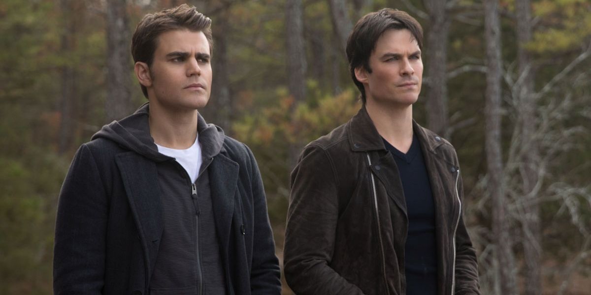 Stefan and Damon standing outside togehter on The Vampire Diaries