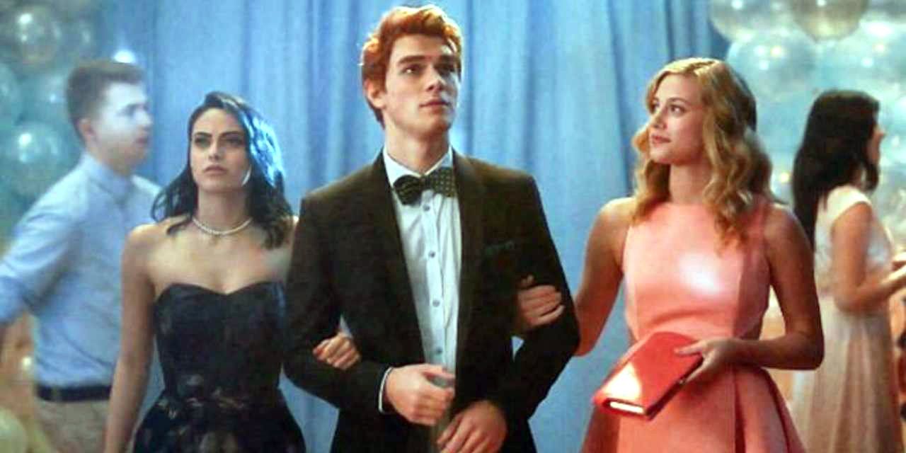 Betty, Veronica and Archie go to prom together in Riverdale.