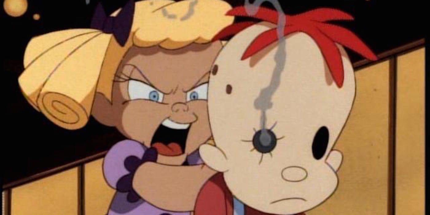 Baby Doll holds a gun behind a toy doll in Batman The Animated Series