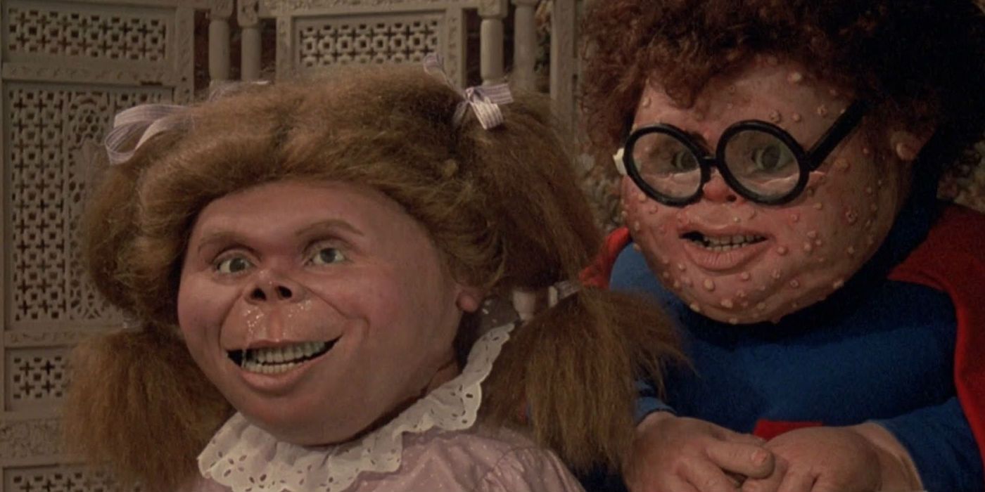 Two characters from the Garbage Pail Kids Movie look on 