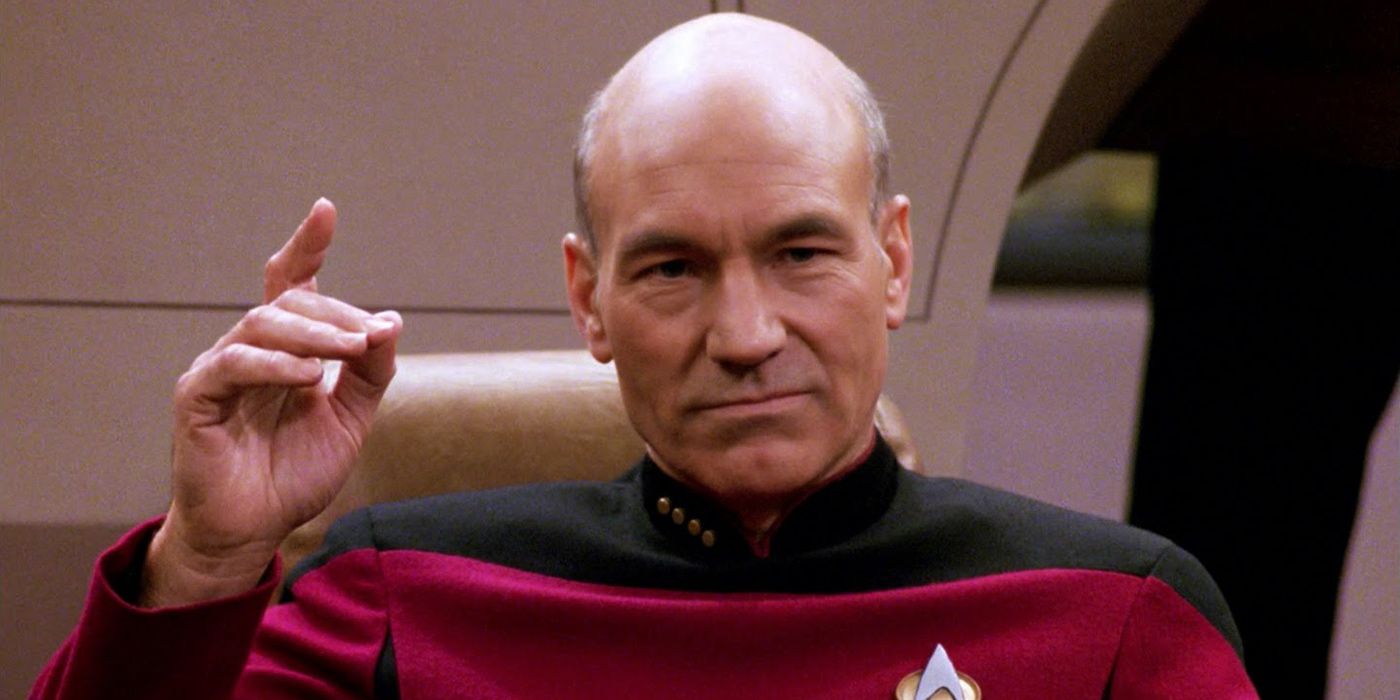 Captain Picard raises a hand in the air from The Next Generation 