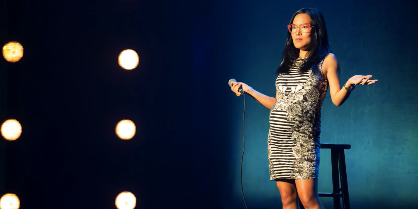 Ali Wong in an animal printed dress in her standup special Baby Cobra