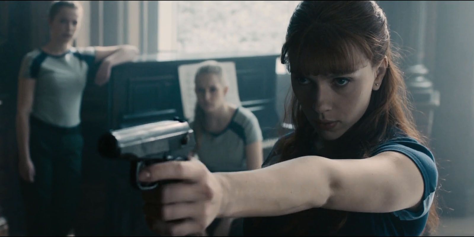 Black Widow fires a gun in Avengers: Age of Ultron