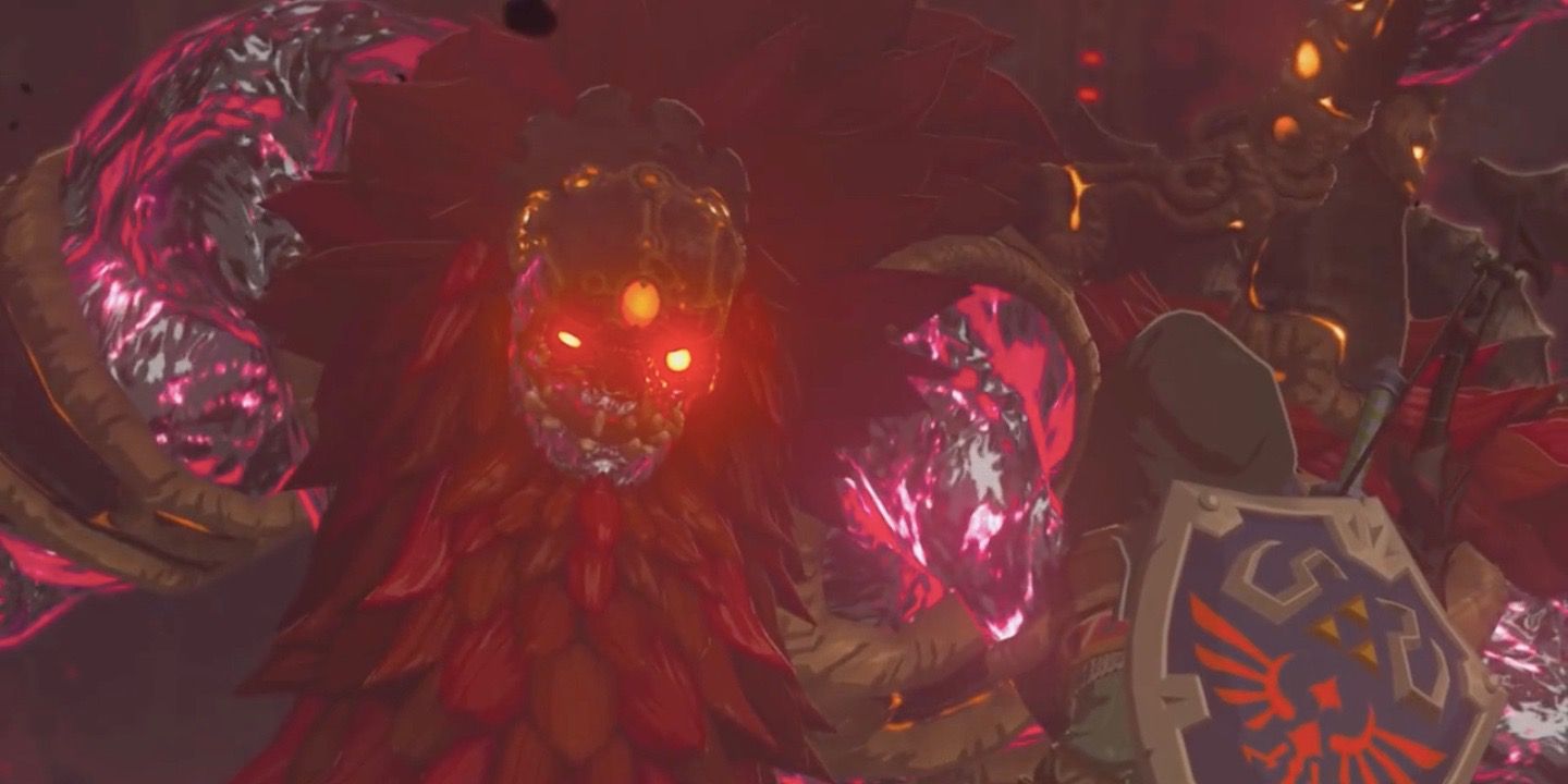 Link standing face-to-face with Calamity Ganon at the end of Breath of the Wild.