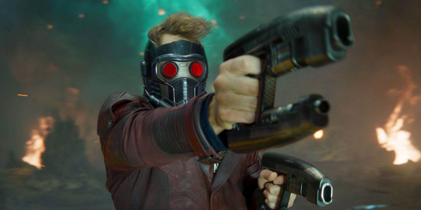 Chris Pratt as Star-Lord firing guns and wearing his mask in Guardians of the Galaxy Vol. 2