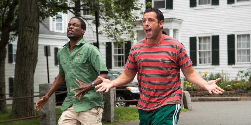 Chris Rock and Adam Sandler walking in Grown Ups 2