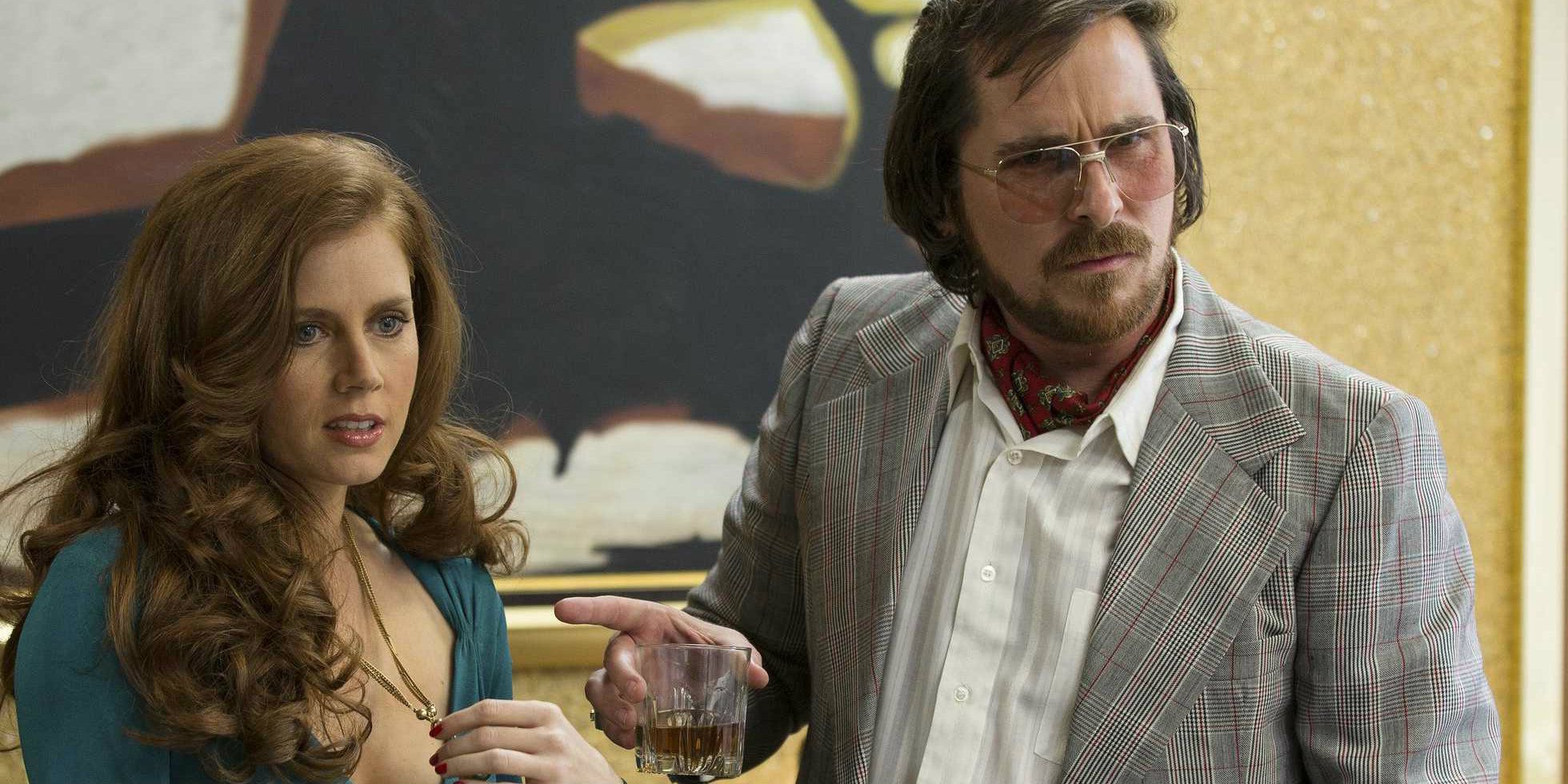 Christian Bale and Amy Adams in American Hustle.