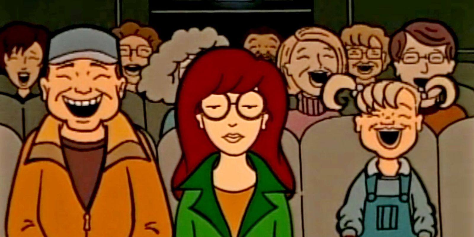 Daria sitting in an auditorium.