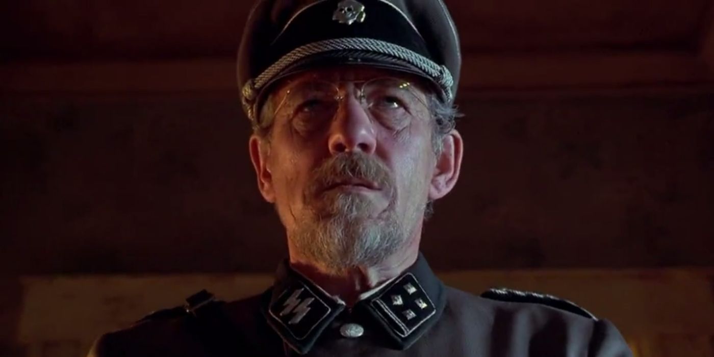 Kurt Dussander looking at something in Apt Pupil