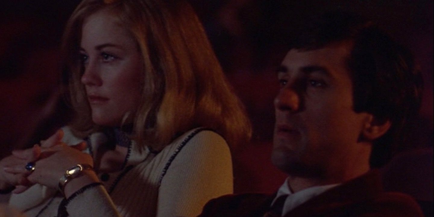 Travis and Betsy sitting in a move theater in Taxi Driver