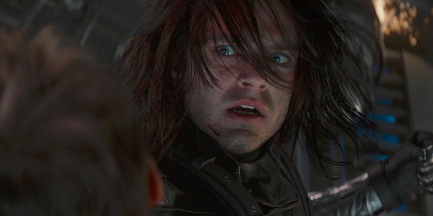 Bucky looking shocked while punching Cap