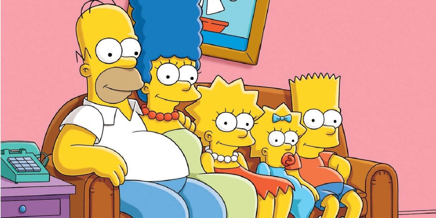 The Simpsons sitting on the couch smiling and watching TV.