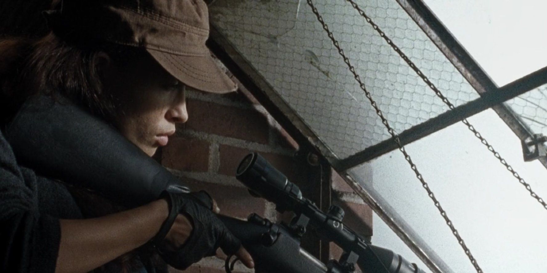 The Walking Dead - Rosita aiming a gun