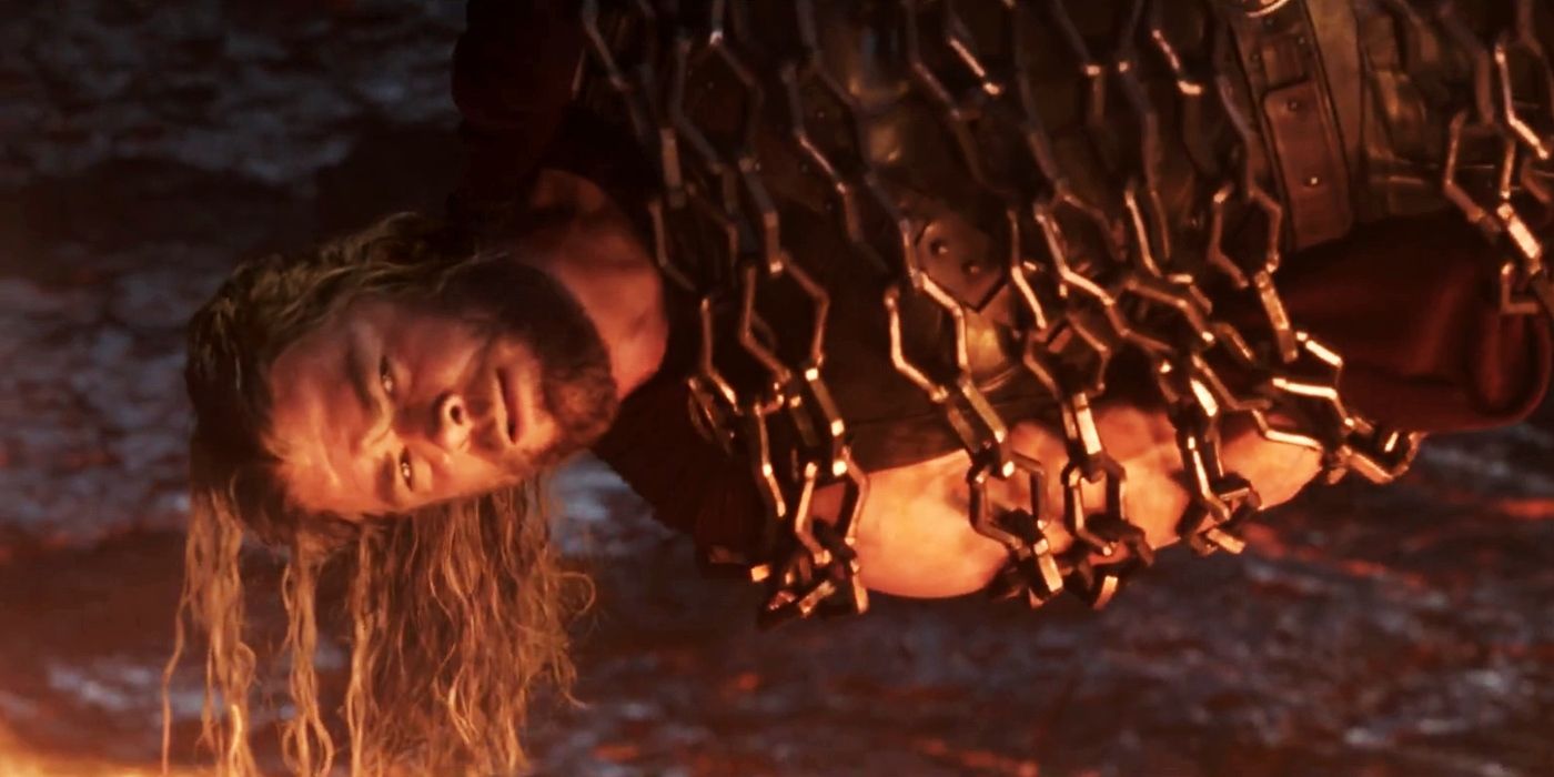 Thor in chains held captive by Surtur in Thor: Ragnarok