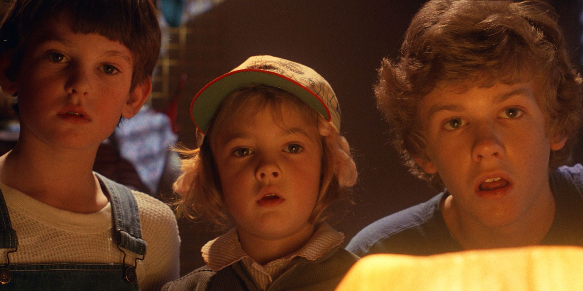 Henry Thomas, Drew Barrymore, and Robert Naughton in E.T.