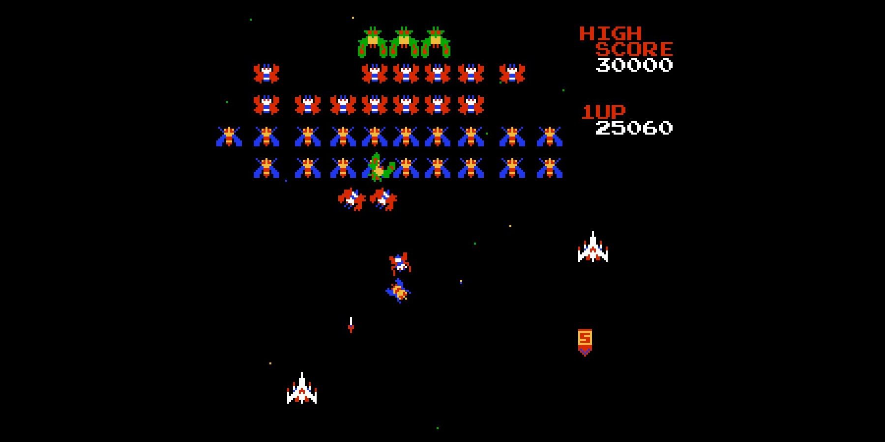 Galaga being played in an arcade.