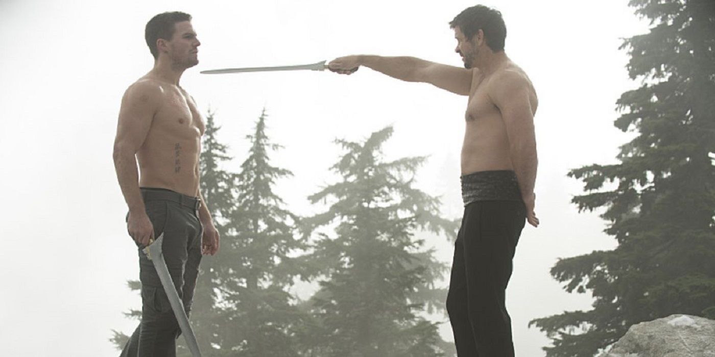 Ra's al Ghul holds a sword to Oliver's throat in Arrow