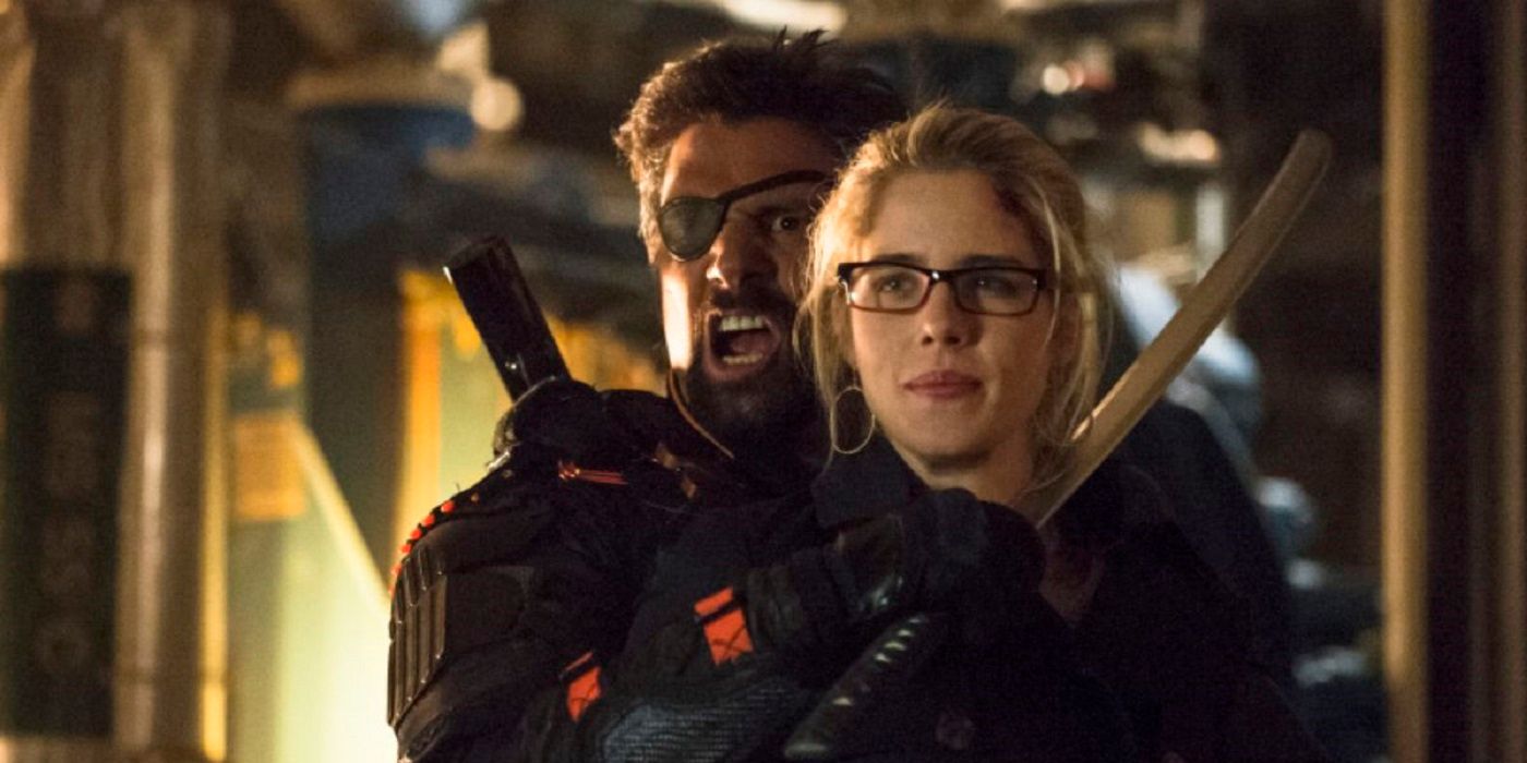 Slade holds a sword to Felicity's throat in Arrow