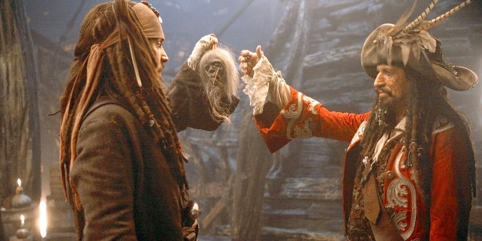 Jack Sparrow looks at a shrunken head given to him by his father