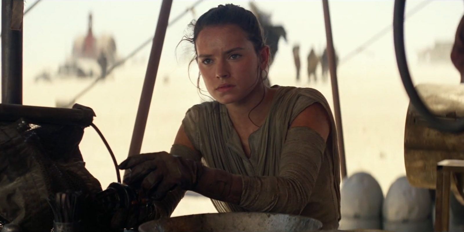 Daisy Ridley as Rey in Star Wars The Force Awakens.
