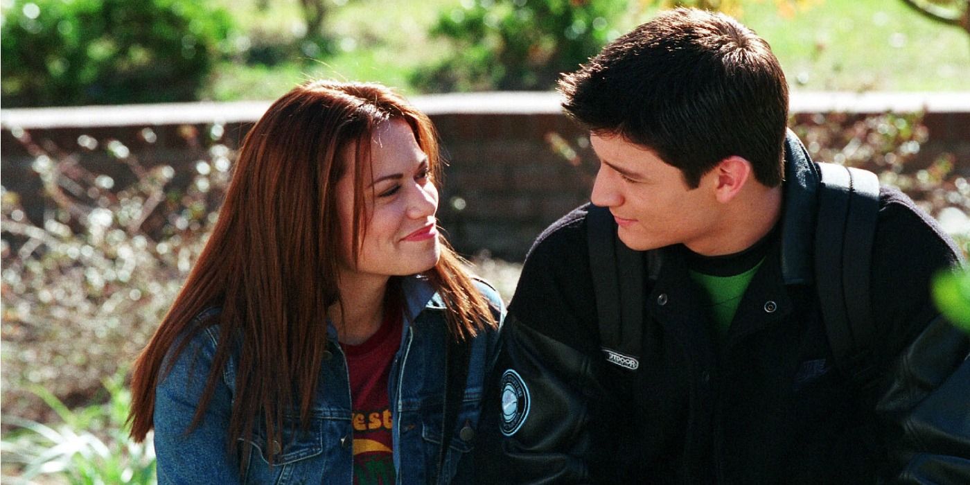 Haley and Nathan looking at each other in One Tree Hill.