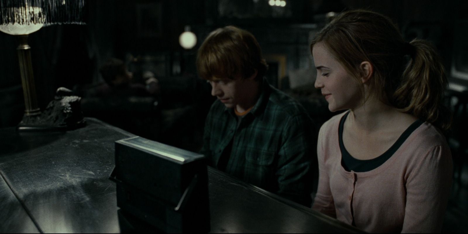 Hermione teaches Ron how to play piano