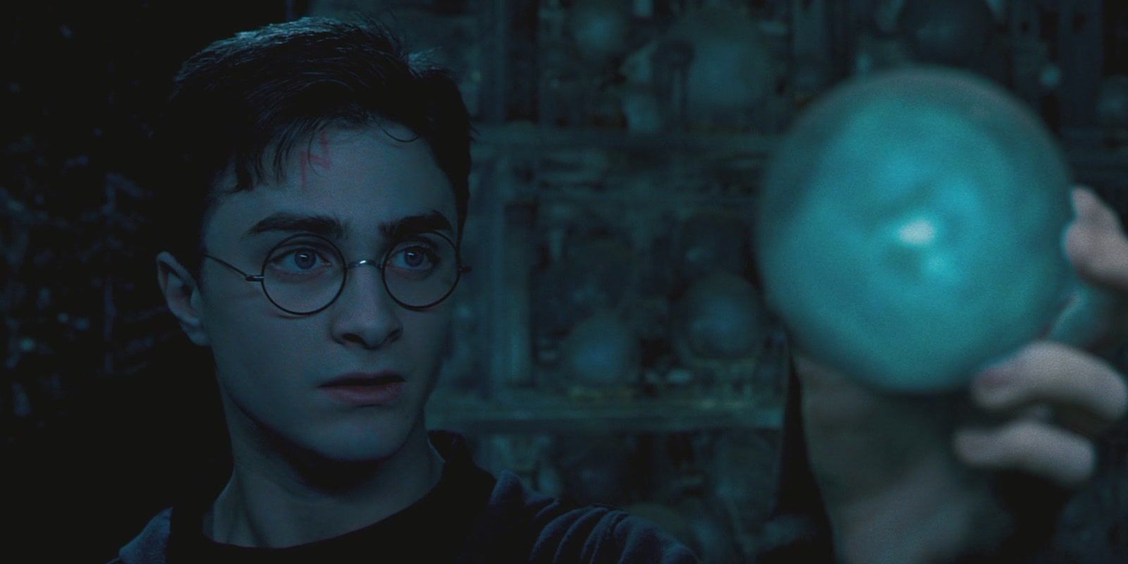 Harry Potter holding the prophecy