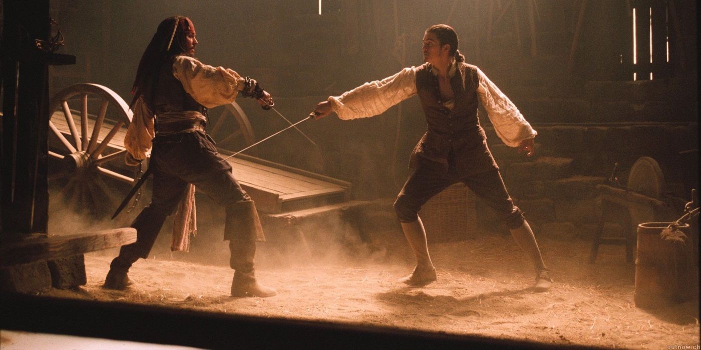 Jack Sparrow and Will Turner in Pirates of the Caribbean The Curse of the Black Pearl, sword fight