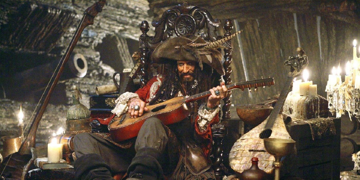 Keith Richards sitting with a guitar in Pirates of the Caribbean: On Stranger Tides