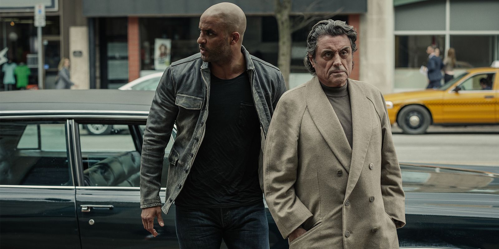 Ricky Whittle and Ian McShane in American Gods