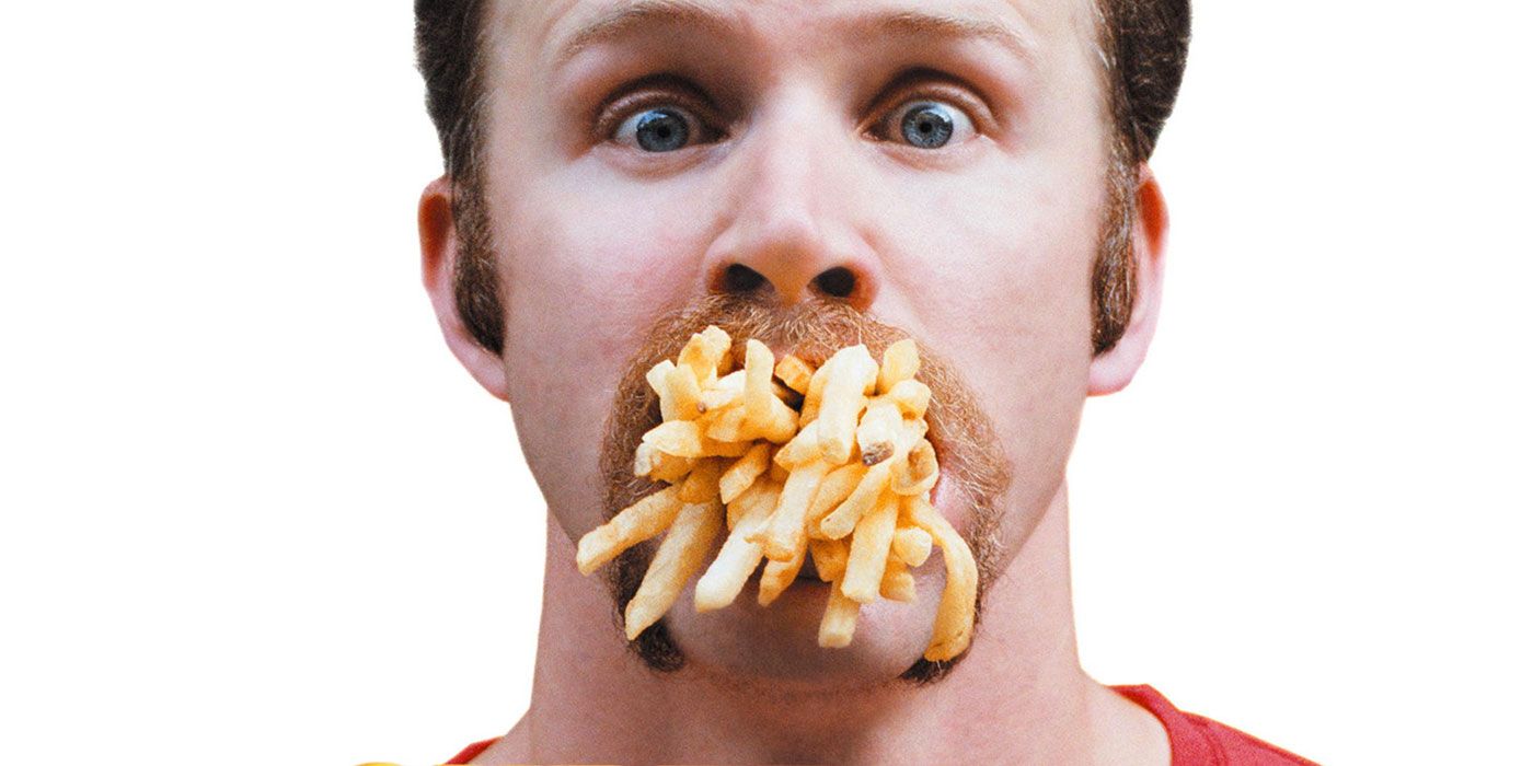 A man has French fries coming out of his mouth to advertise Supersize Me