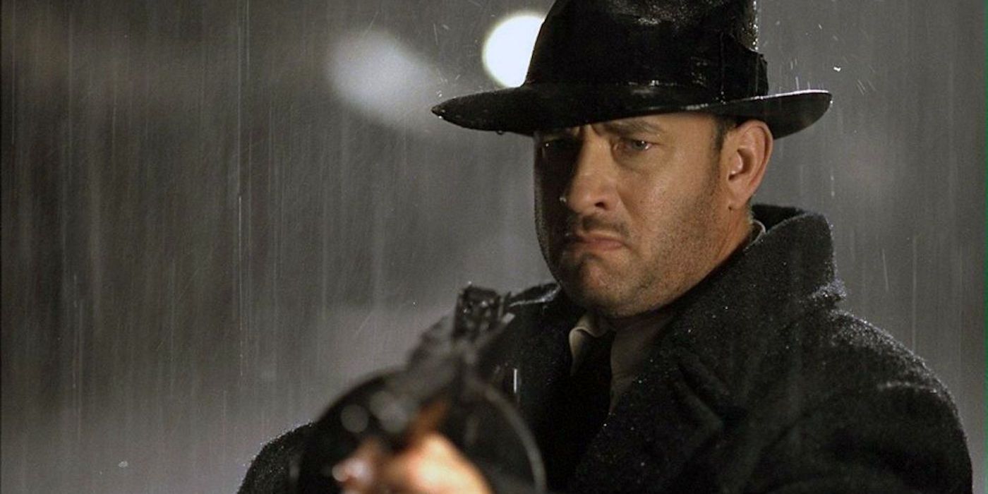 Tom Hanks with a gun in Road to Perdition