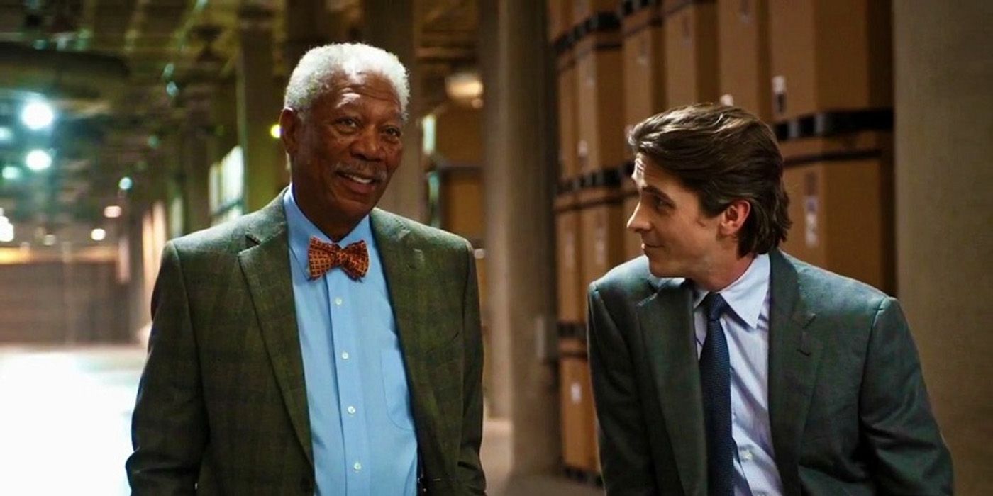 Bruce Wayne banters with Lucius Fox in The Dark Knight