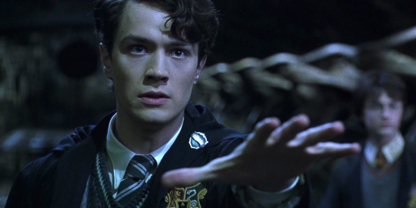 Young Tom Riddle holding out his hand in Harry Potter and the Chamber of Secrets
