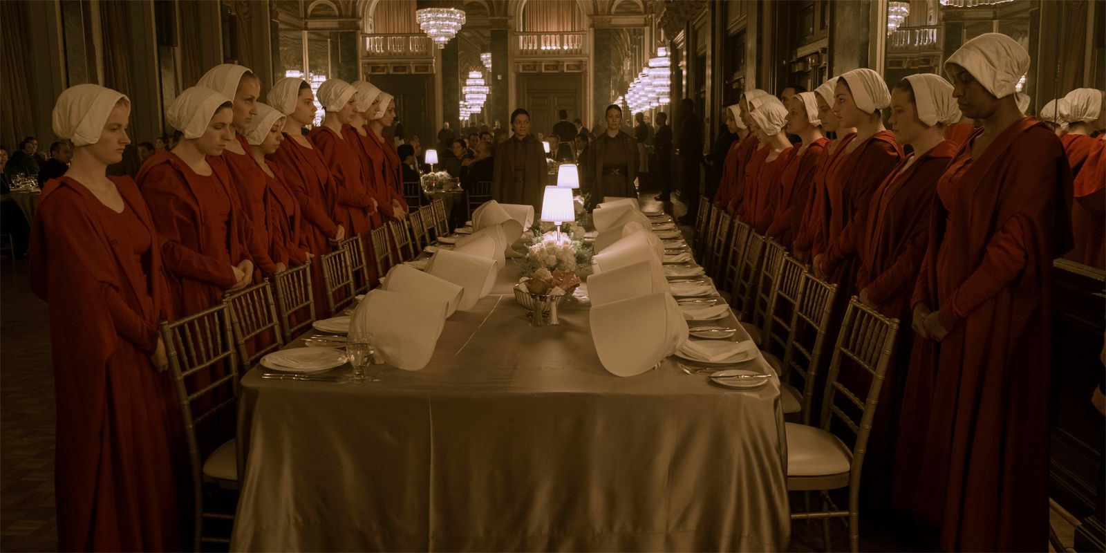 Handmaidens prepare for a state dinner in The Handmaid's Tale