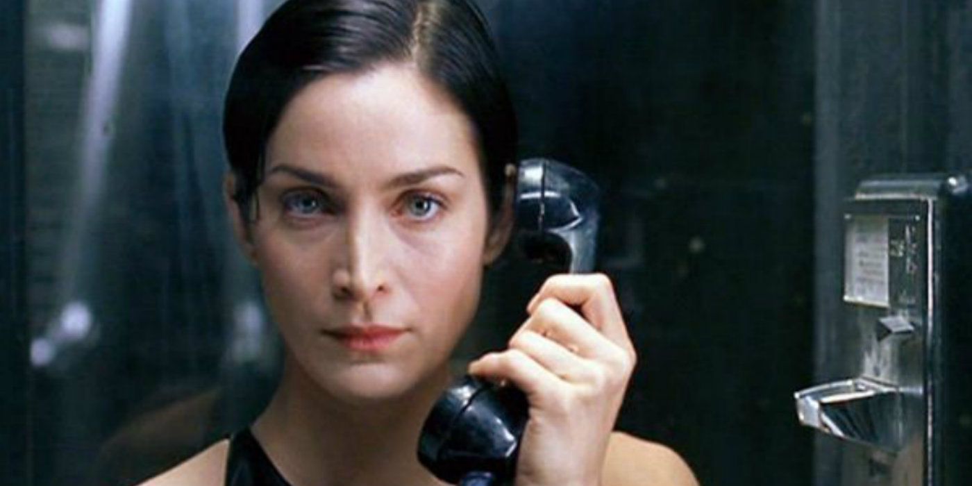 Carrie Anne Moss as Trinity on the call in The Matrix 