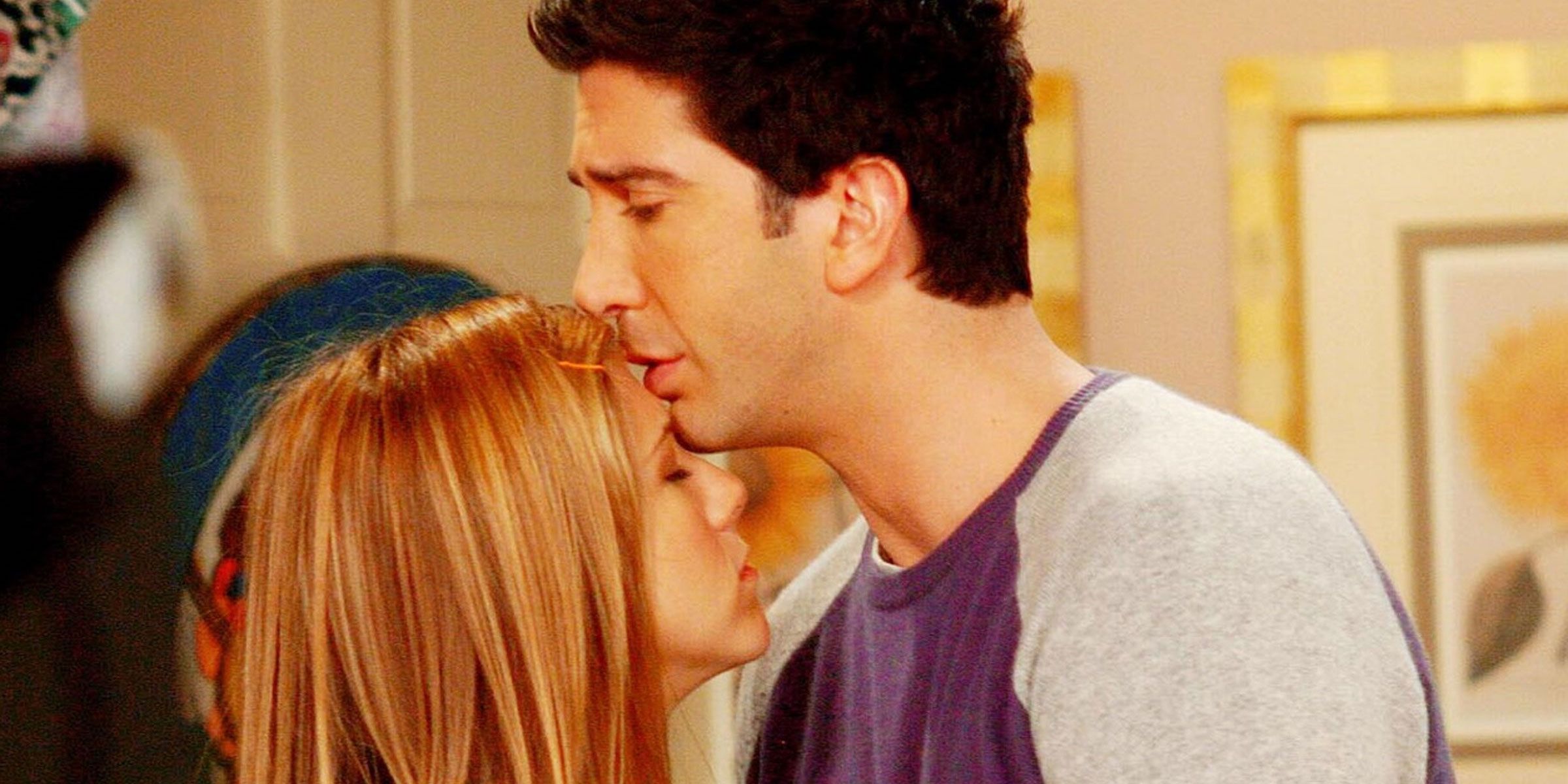 Rachel and Ross standing together on Friends