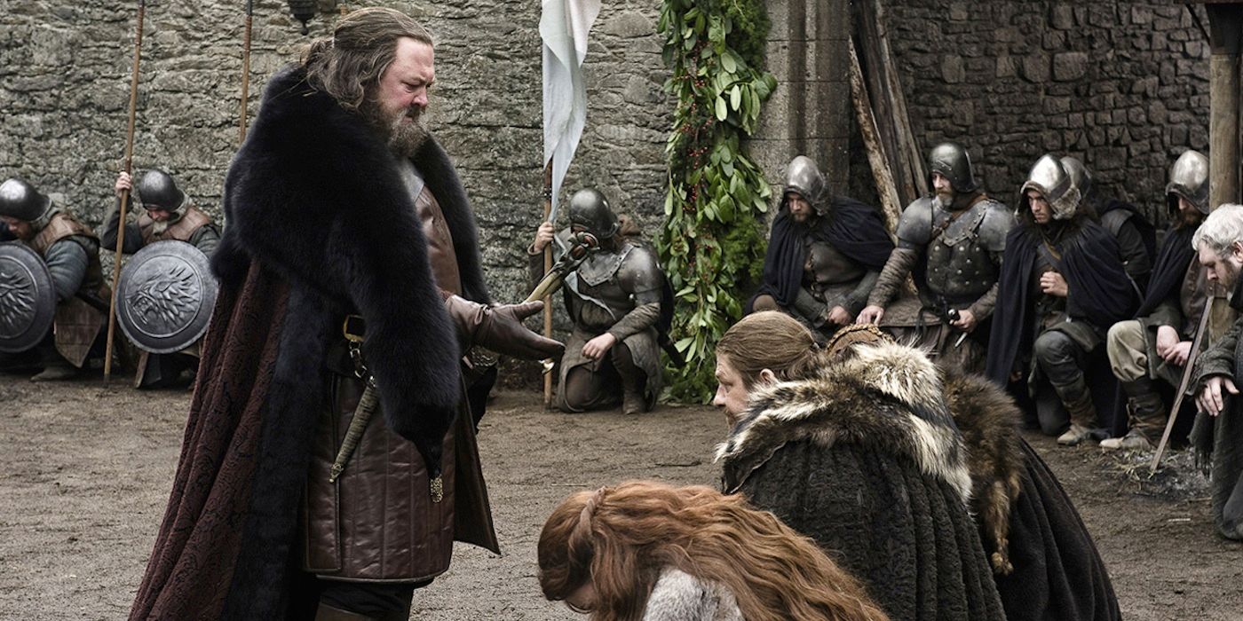 Ned Stark kneels before Robert Baratheon in Game Of Thrones