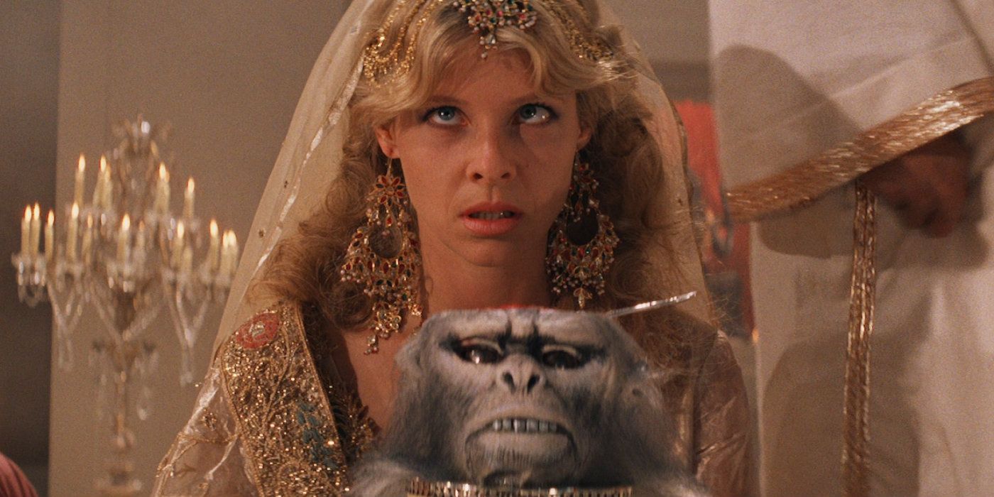 A woman looks shocked at seeing monkey brains from Indiana Jones and the Temple of Doom