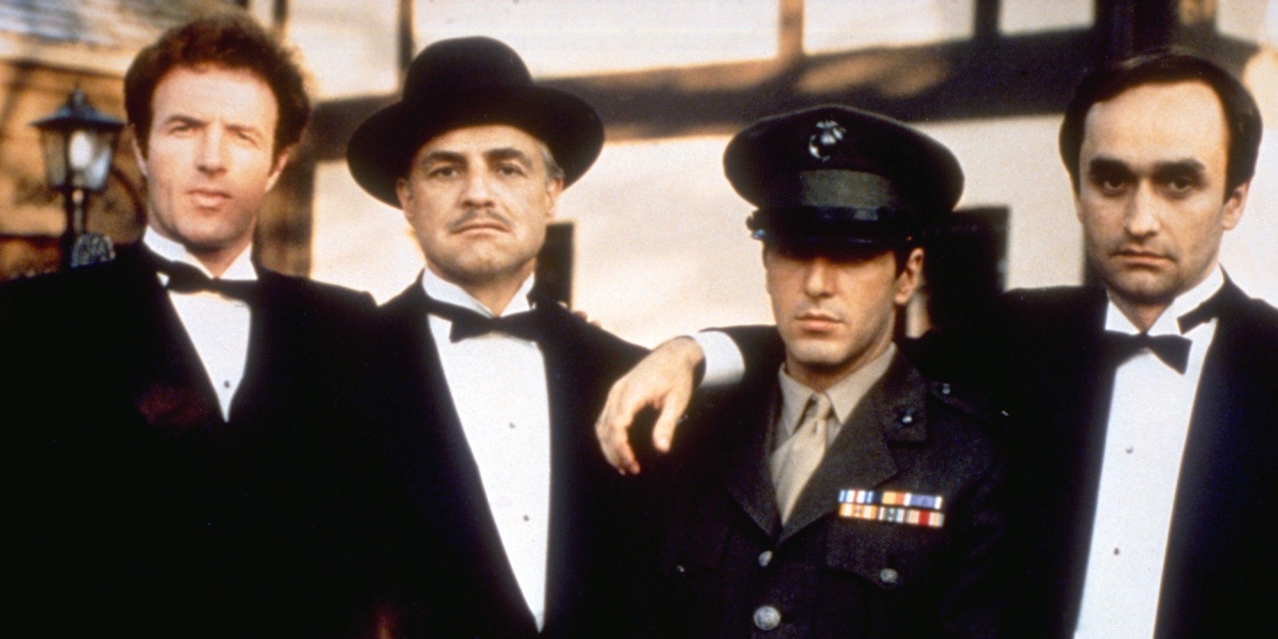 James Caan as Sonny, Marlon Brando as Don Vito Corleone, Al Pacino as Michael and John Cazale as Fredo in The Godfather