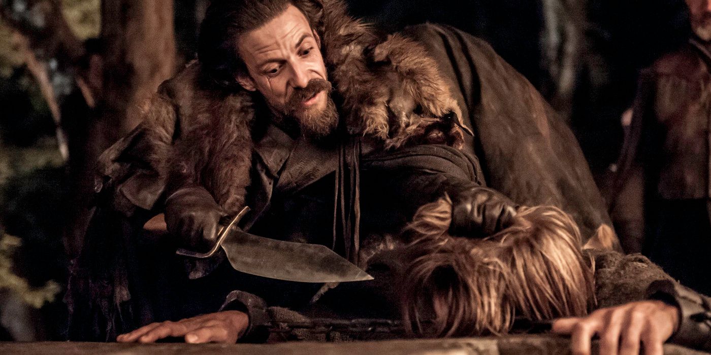 Locke threatens Jaime Lannister with a big knife in Game of Thrones season 3