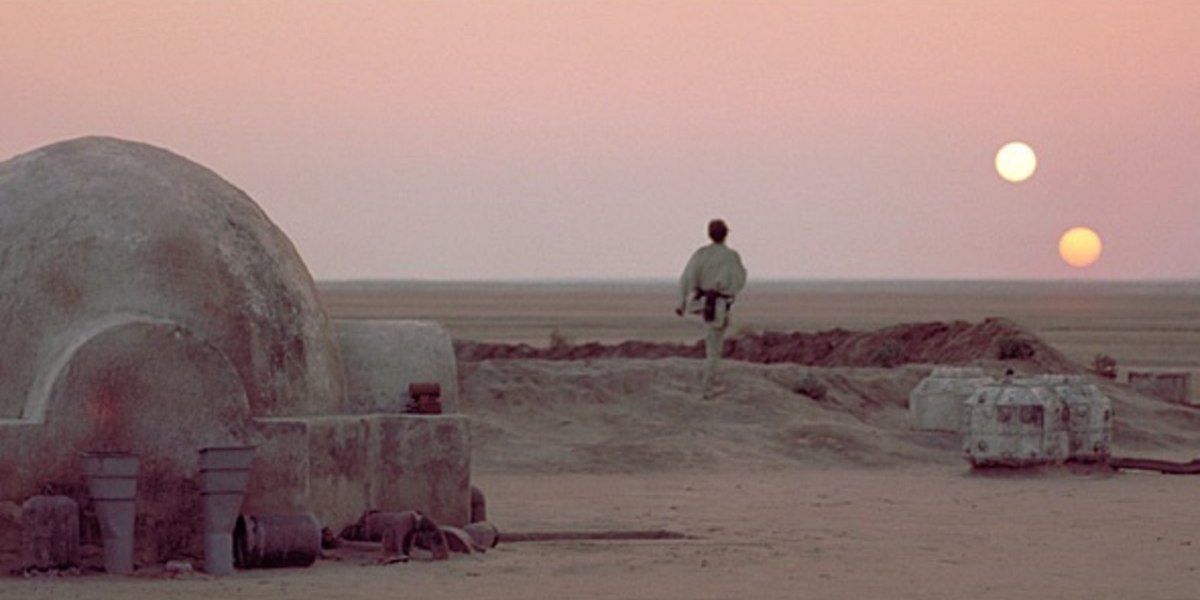 Luke staring at the two setting suns in Star Wars A New Hope