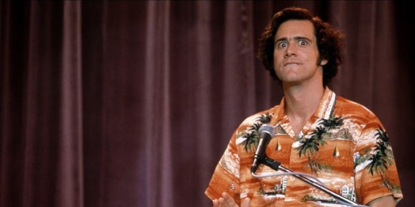 Jim Carey in front of a curtain in Man On The Moon