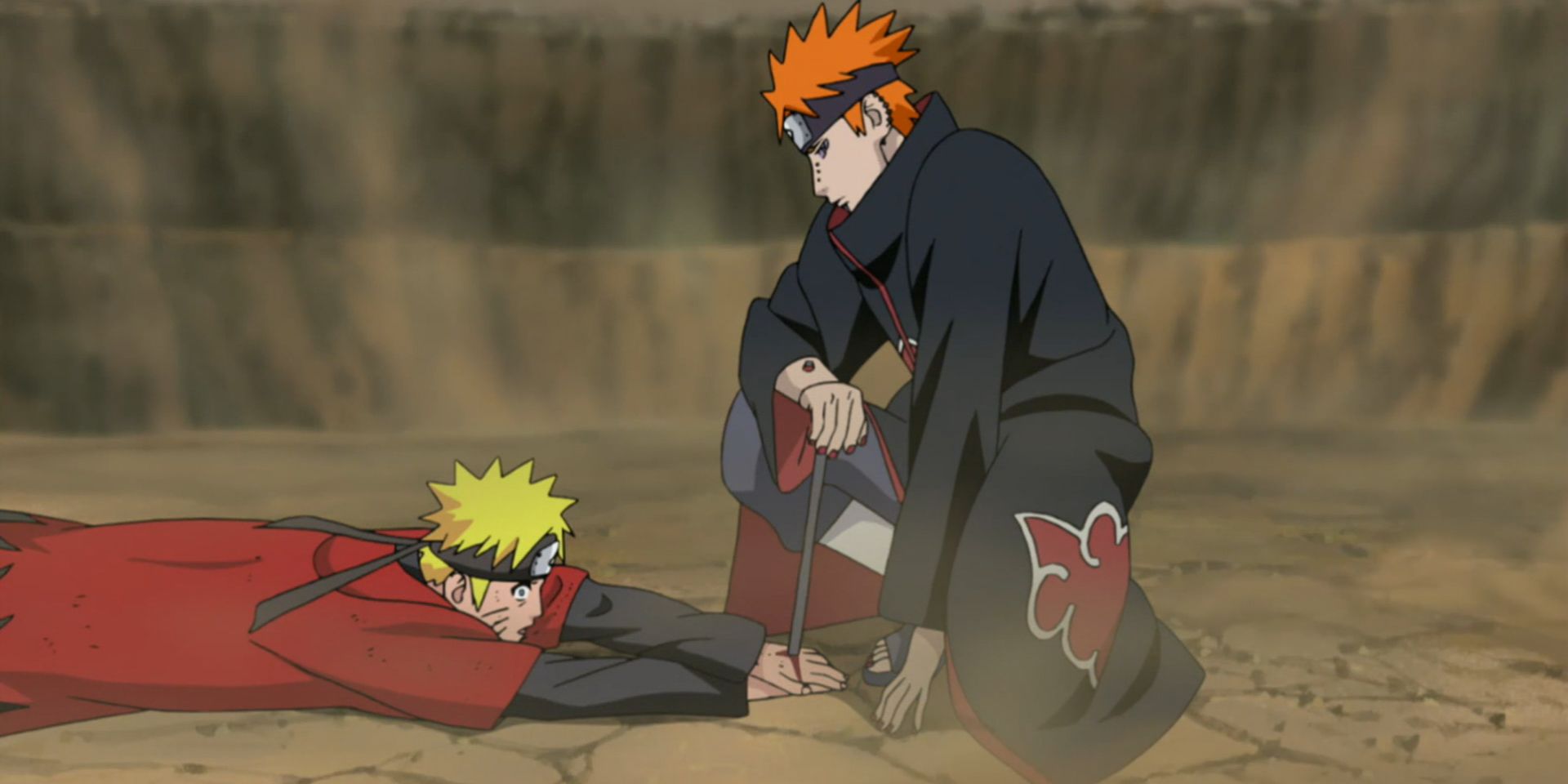 Pain impaling Naruto's hands and pinning him to the ground in Naruto.