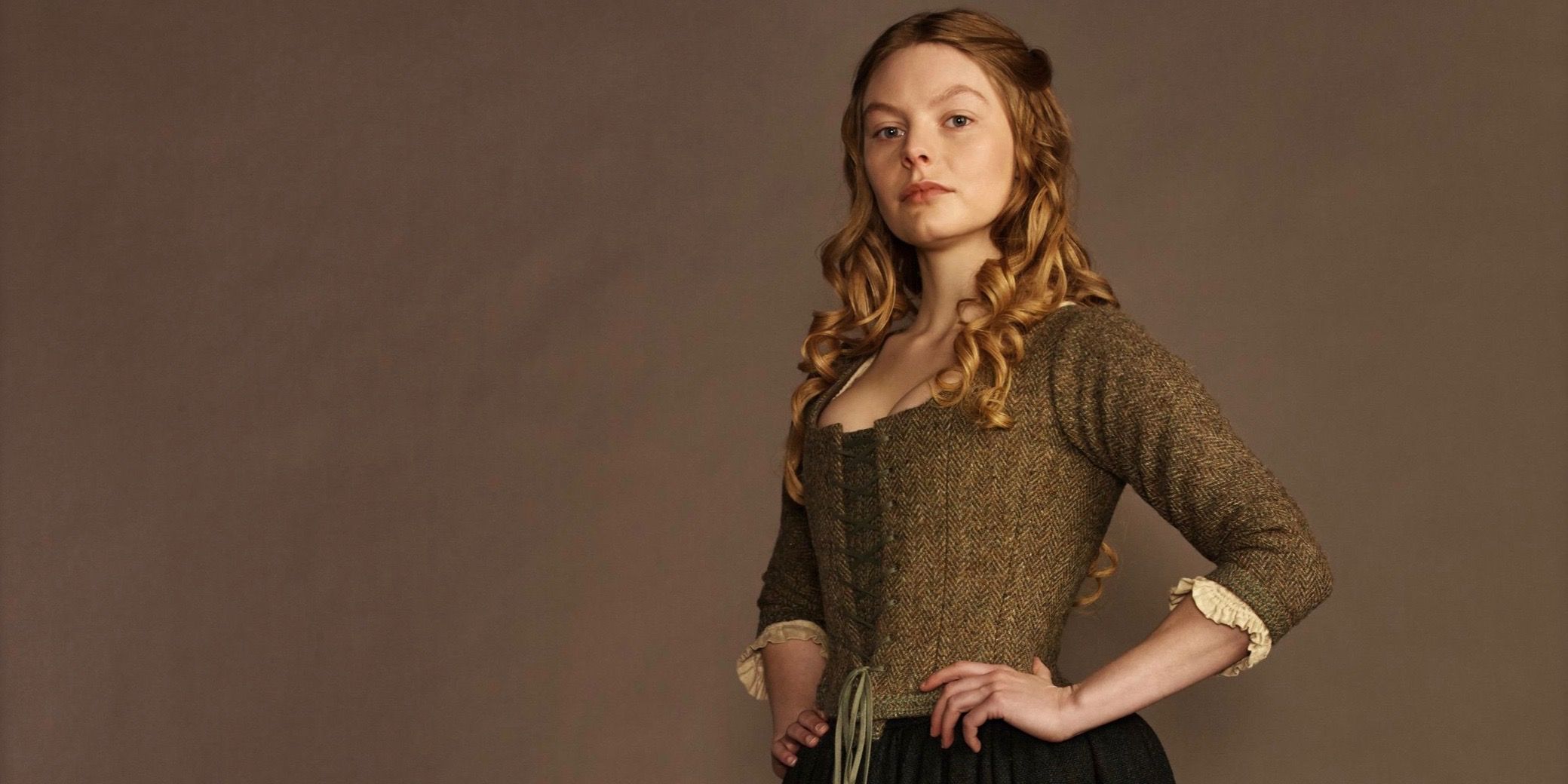 Nell Hudson as Laoghaire MacKenzie on Outlander