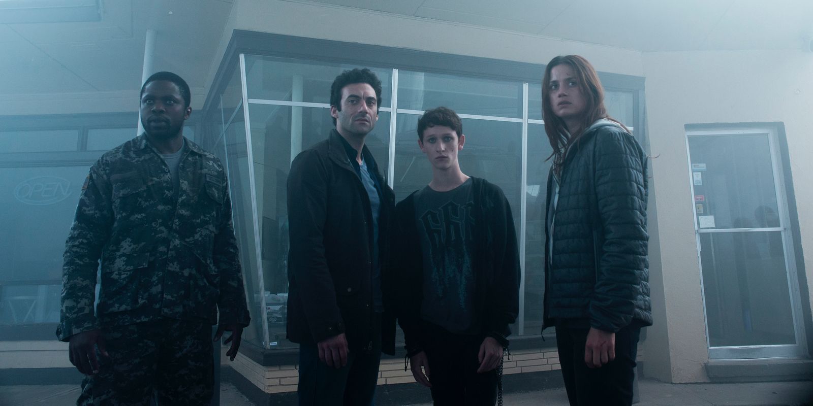 Okezie Morro, Morgan Spector, Russell Posner, and Danica Curcic stand together in The Mist