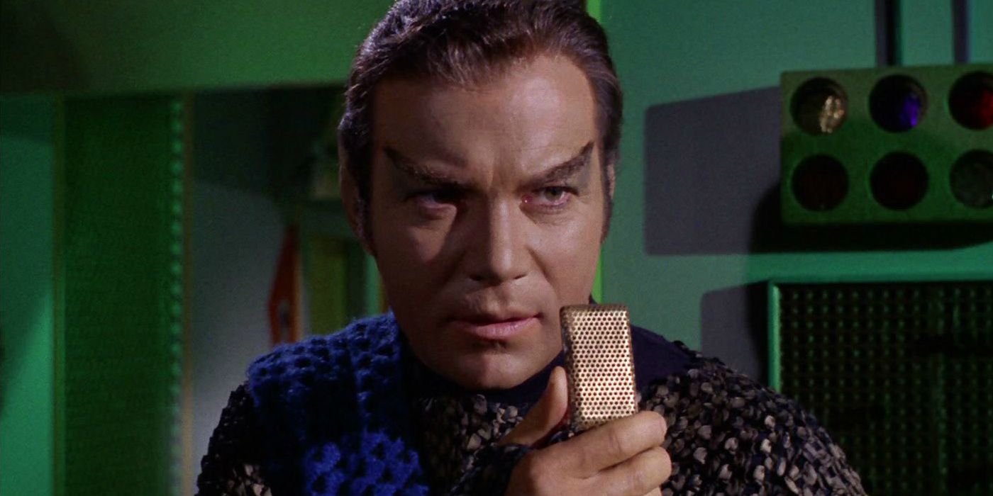 Kirk uses a communicator while disguised as a Romulan from The Enterprise Incident 