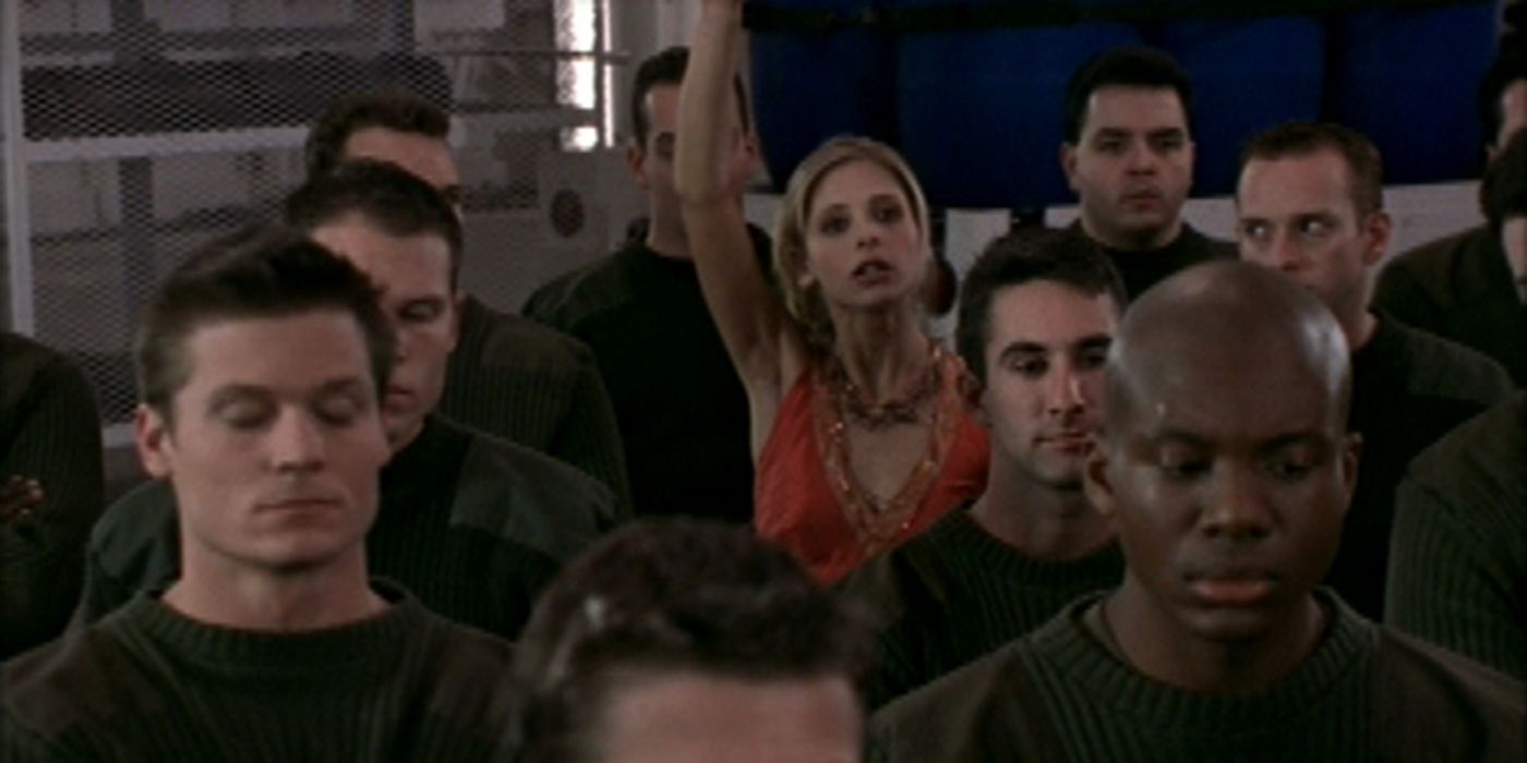 Buffy raising her hand as if to ask a question in Buffy the Vampire Slayer