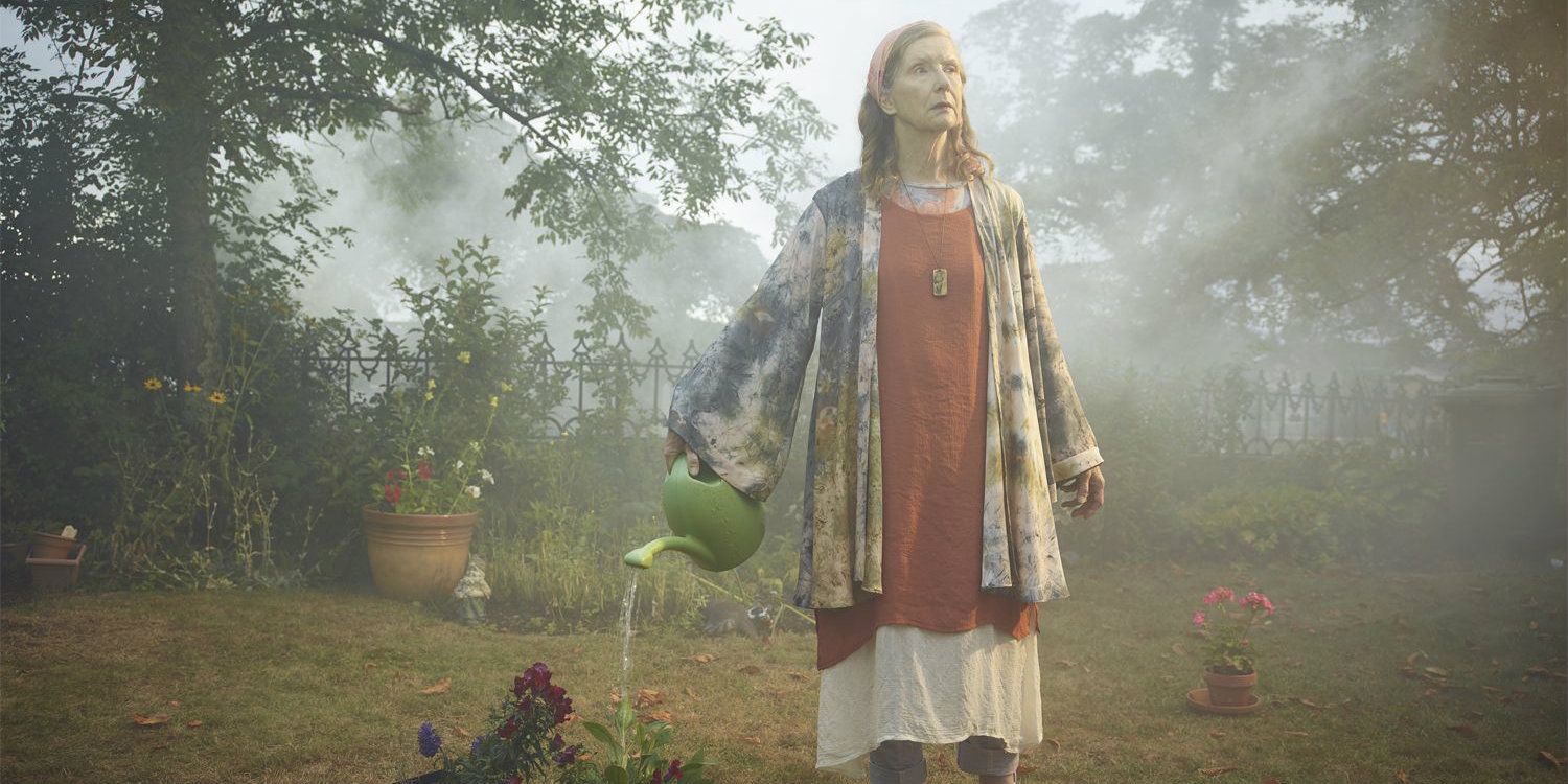 Frances Conroy watering her plants in The Mist tv show